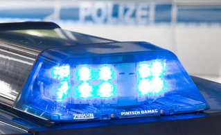 Spezialeinheiten nahmen zwei Männer vorläufig fest. (Symbolbild) — © Friso Gentsch/dpa
