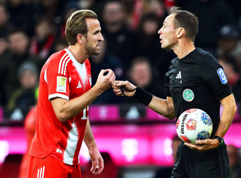 Harry Kane (l) war im Duell mit dem BVB überall im Einsatz. — © Sven Hoppe/dpa