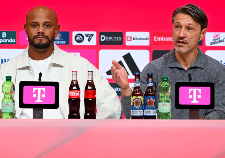 Bayern-Coach Vincent Kompany (l) war zufrieden, BVB-Coach Niko Kovac nicht. — © Sven Hoppe/dpa