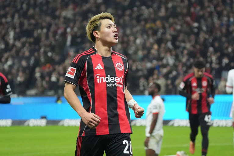Bejubelt das 1:0 der Eintracht: Ritsu Doan. — © Marc Schüler/dpa