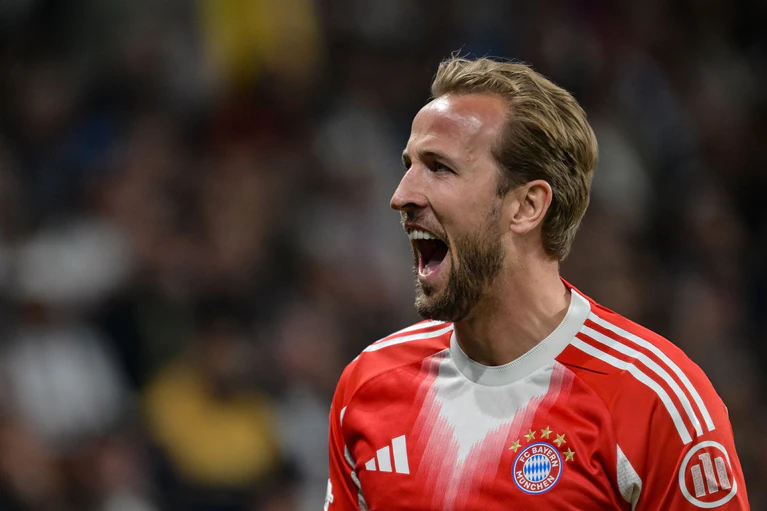 Harry Kane hat zugeschlagen: Der Engländer jubelt nach seinem 2:0. — © Peter Kneffel/dpa