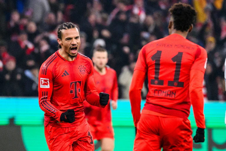 Torschütze zum 1:0 - Leroy Sané (l). — © Tom Weller/dpa